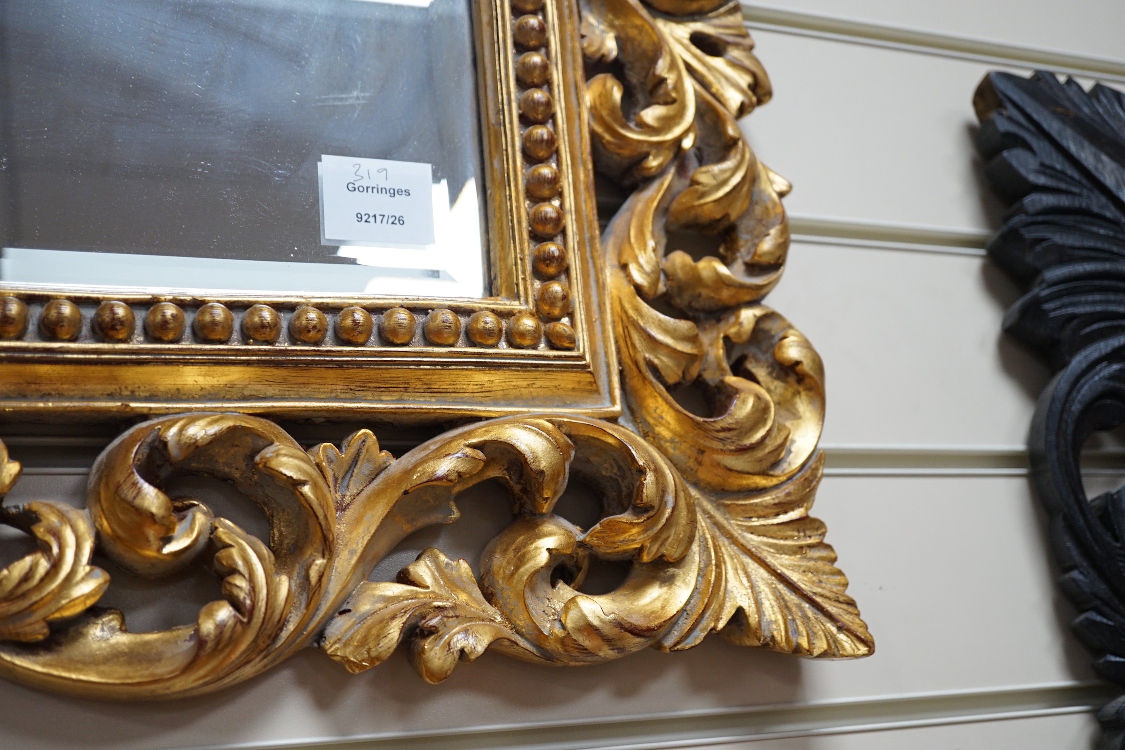 A Florentine giltwood wall mirror, width 98cm, height 77cm *Please note the sale commences at 9am.